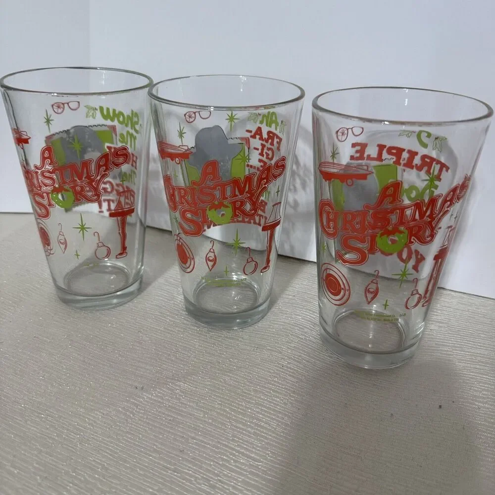 A Christmas Story Collectors Series lot of 3 Pint Drinking Glasses Movie Quotes